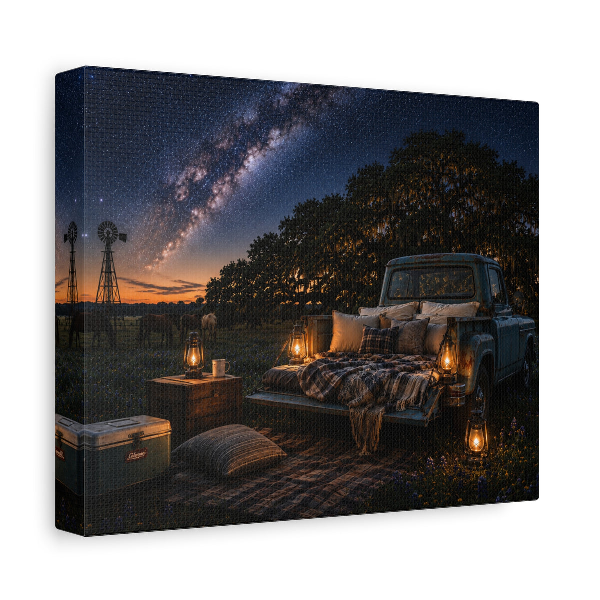 A square Starry Night canvas print showing a cozy outdoor bed beside a vintage pickup in a country field, with lanterns, pillows, blankets, windmills, and the Milky Way overhead, photographed at an angle on a white background.