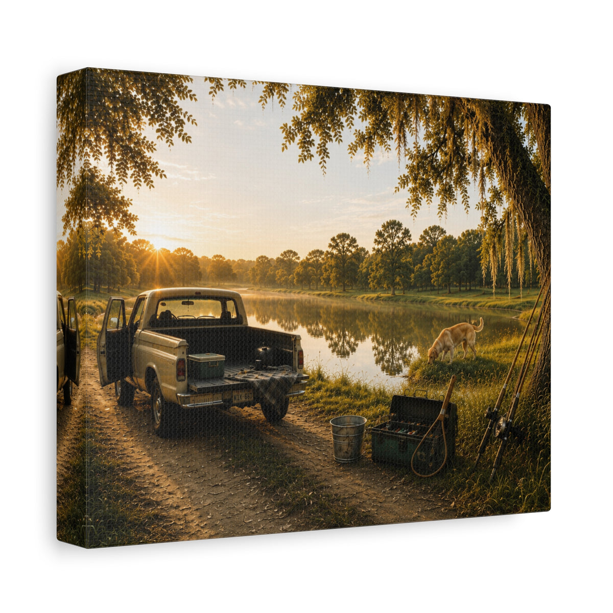 A rectangular The Old Fishing Hole canvas print showing a vintage pickup parked beside a quiet pond at sunset, with a dog, fishing rods, tackle, a cooler, and a moss-draped tree, photographed at an angle on a white background.