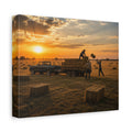 A square Hay Season canvas print showing farmworkers loading rectangular hay bales onto a flatbed trailer beside a pickup truck in a golden field at sunset, photographed at an angle on a white background.