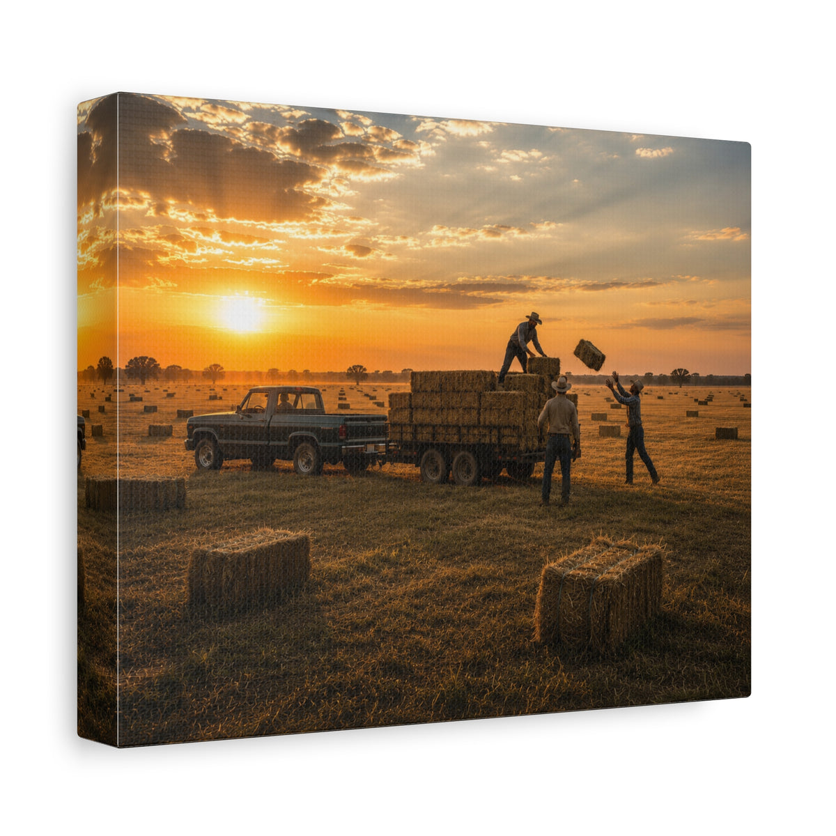 A square Hay Season canvas print showing farmworkers loading rectangular hay bales onto a flatbed trailer beside a pickup truck in a golden field at sunset, photographed at an angle on a white background.