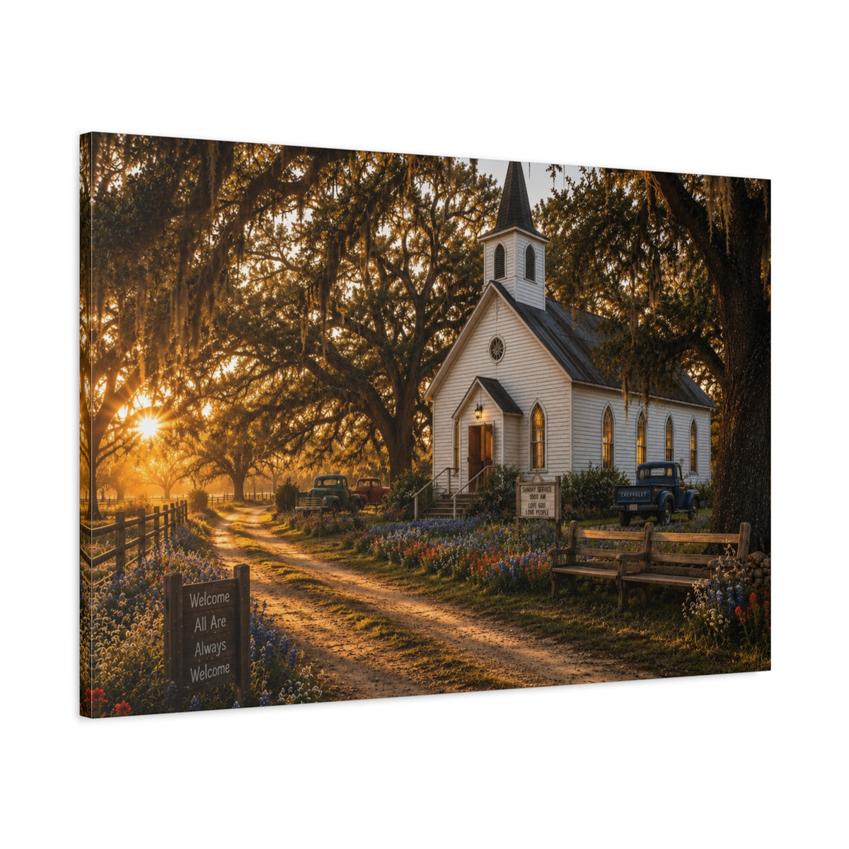 A rectangular The Country Church canvas print showing a small white country church with a steeple beside a dirt path, framed by moss-draped oak trees, rustic benches, wildflowers, and warm sunset light, photographed at an angle on a white background.