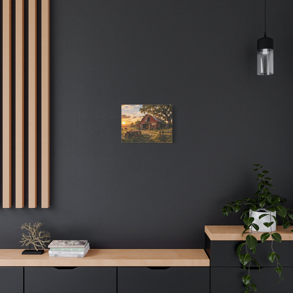 The Old Red Barn canvas print depicting a weathered red cattle barn beneath a moss-draped oak at sunset, with a vintage tractor, grazing cows, a wooden fence, and wildflowers in the foreground.