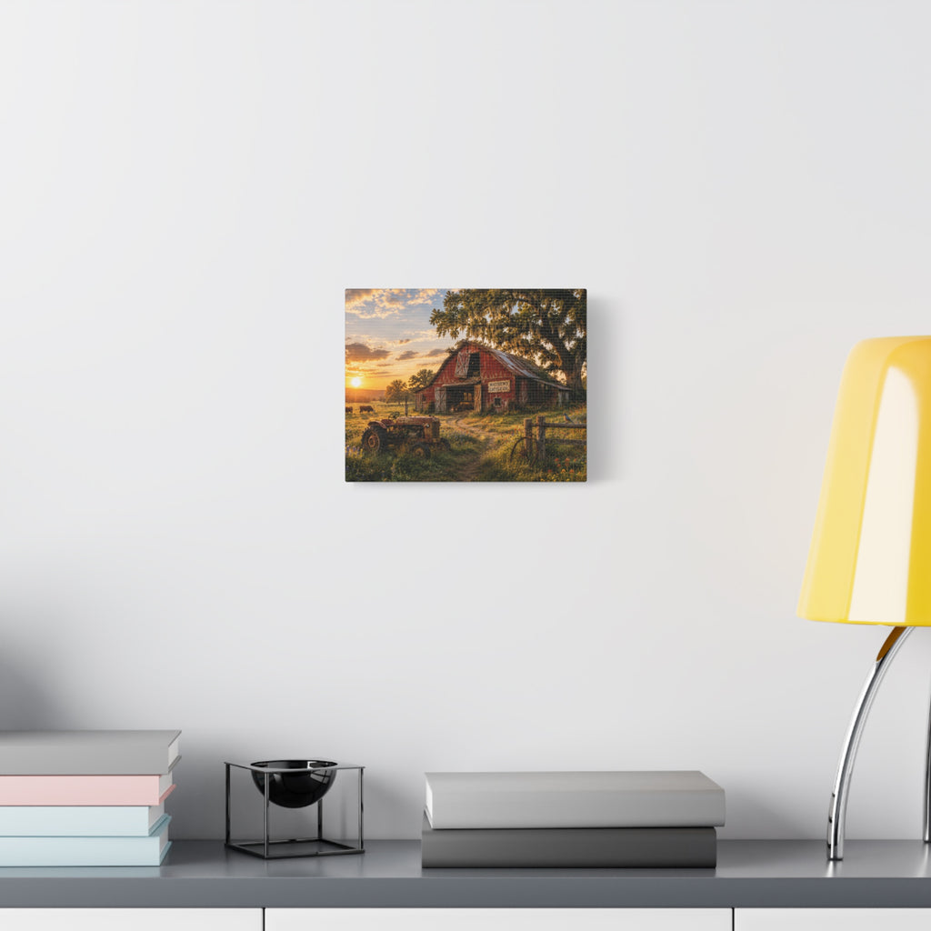 The Old Red Barn canvas print depicting a weathered red cattle barn beneath a moss-draped oak at sunset, with a vintage tractor, grazing cows, a wooden fence, and wildflowers in the foreground.