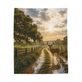 After the Rain blanket shown flat against a white background, featuring a buck on a rain-soaked country lane bordered by wooden fences, wildflowers, and moss-draped oak trees, with sunlight breaking through clouds.