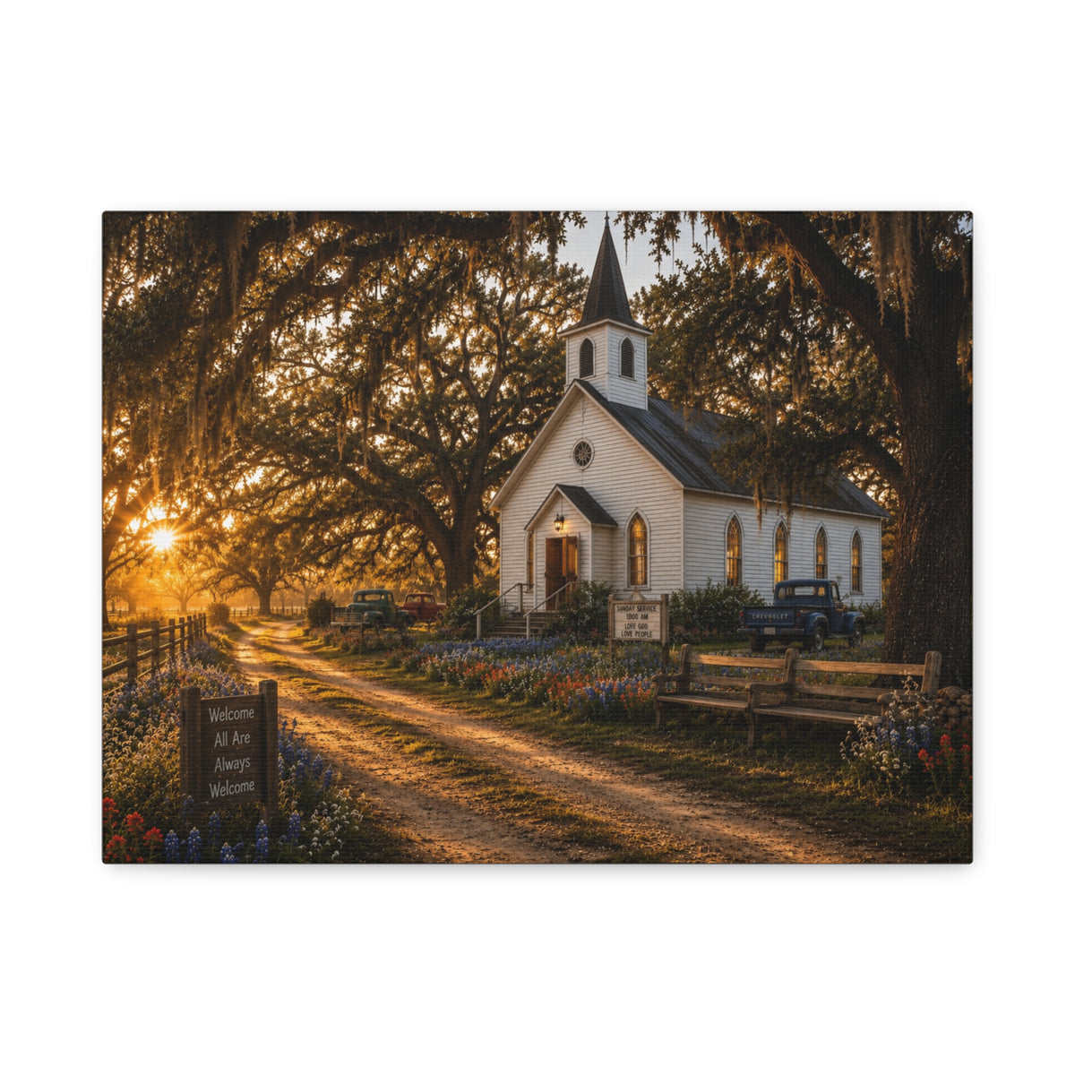 A rectangular The Country Church canvas print showing a small white country church with a steeple beside a dirt path, framed by moss-draped oak trees, rustic benches, wildflowers, and warm sunset light, photographed on a white background.